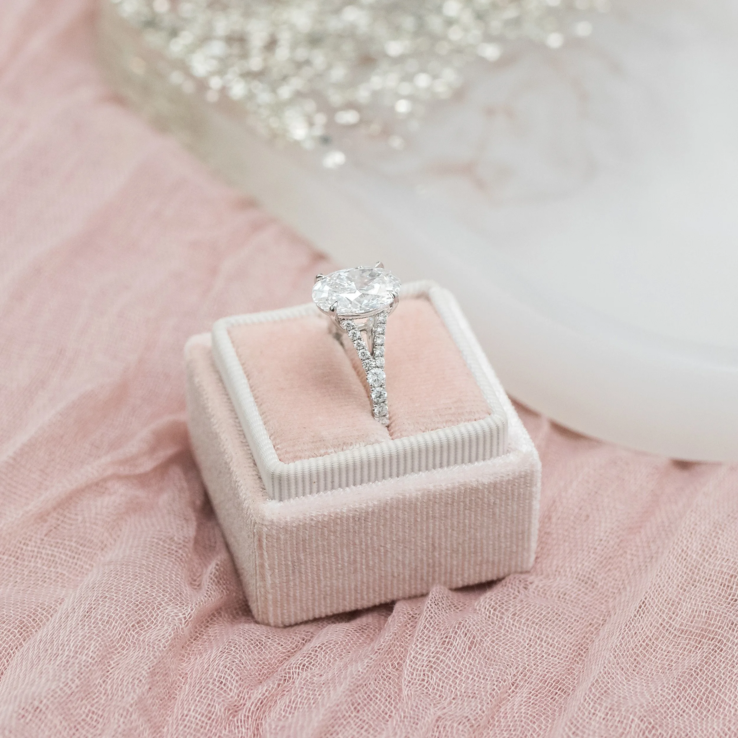 platinum 3.5ct oval cut man made diamond engagement ring with split shank pavé band ada diamonds design AD-153