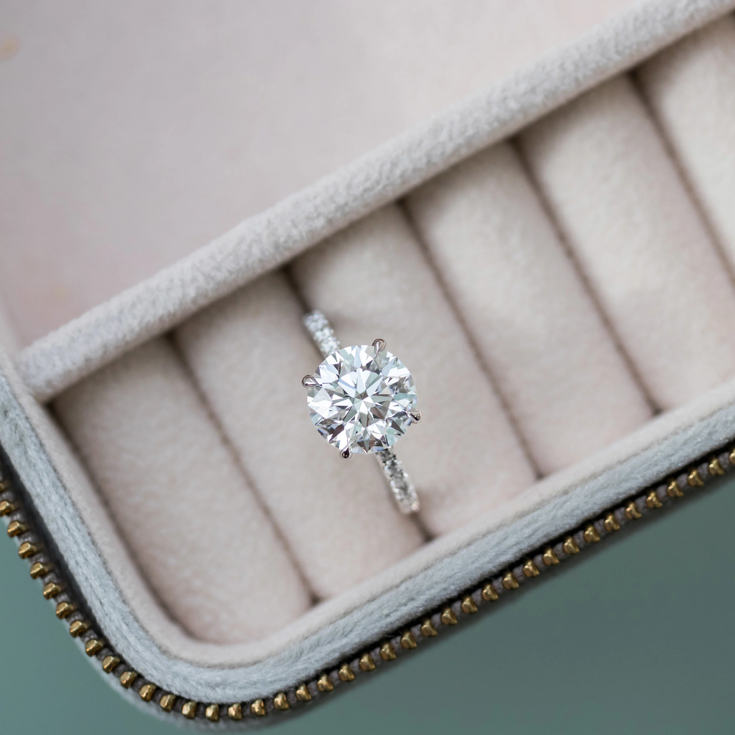 3.25 ctw Man Made Diamonds set in Platinum Round Petite Four Prong Pavé Diamond Engagement Ring (Main View)