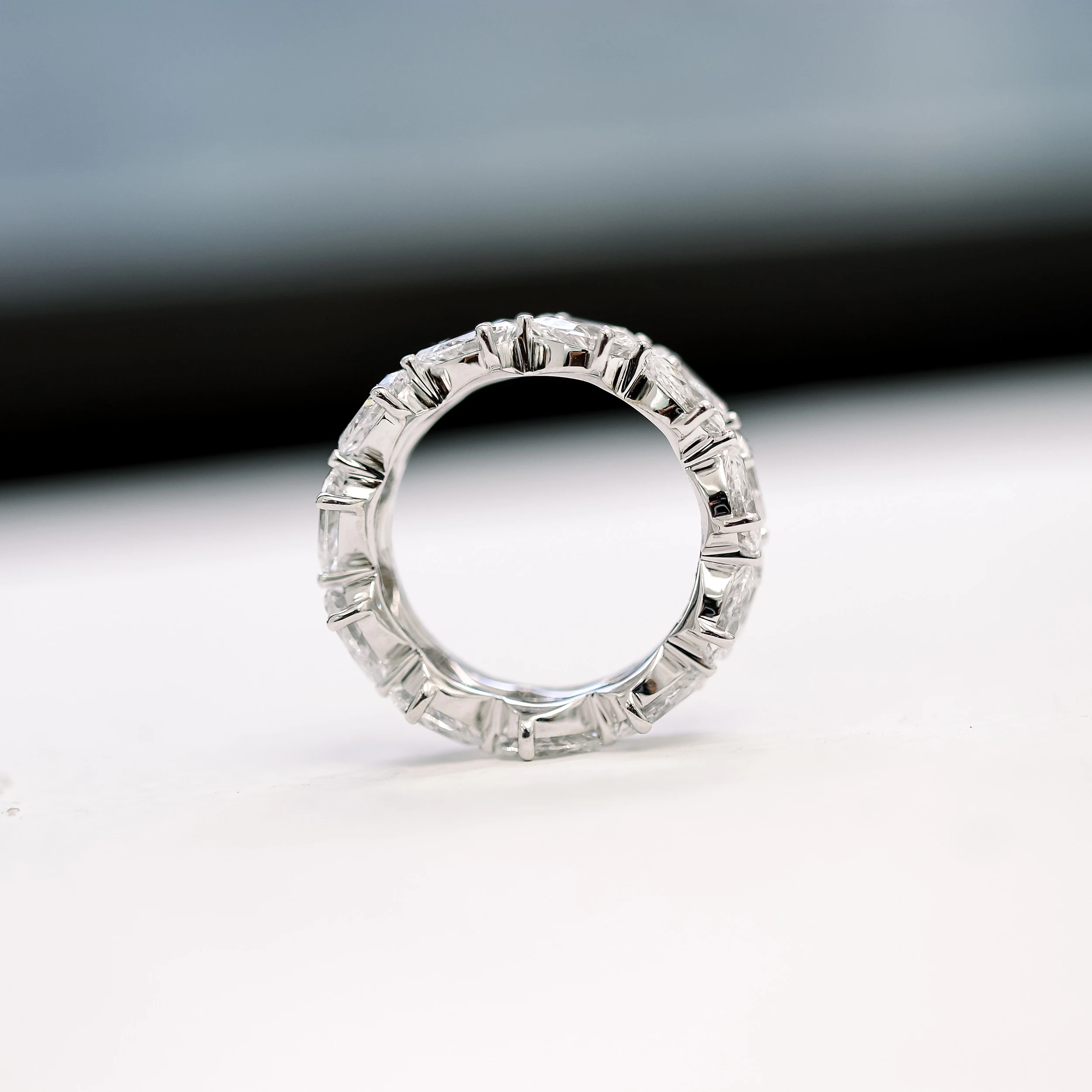 High Quality 3.0 ct Lab Diamonds set in 18 Karat White Gold Pear East-West Eternity Band (Main View)