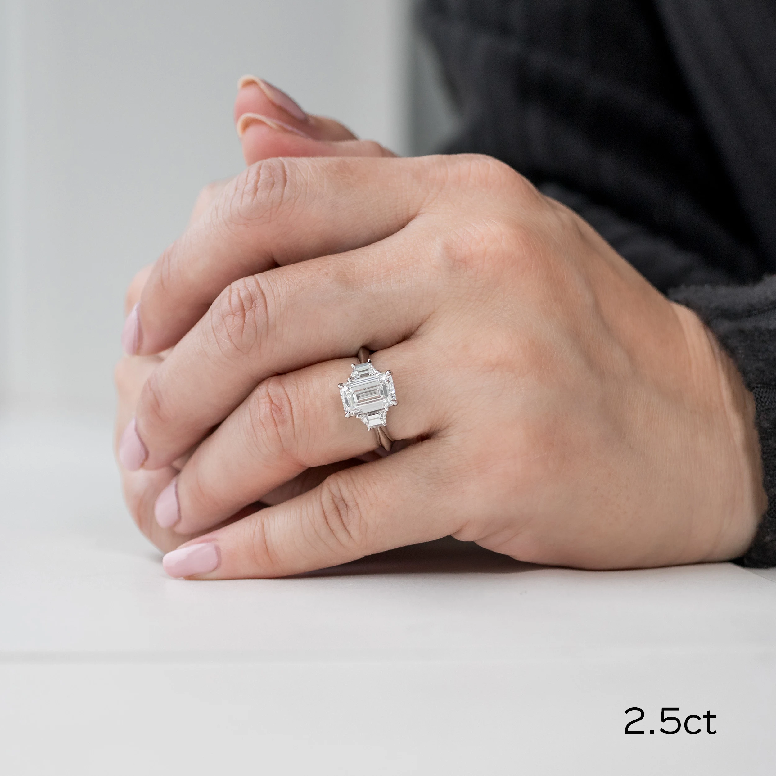 Platinum Emerald and Trapezoid Diamond Engagement Ring featuring 2.5 ct Lab Diamonds (Main View)