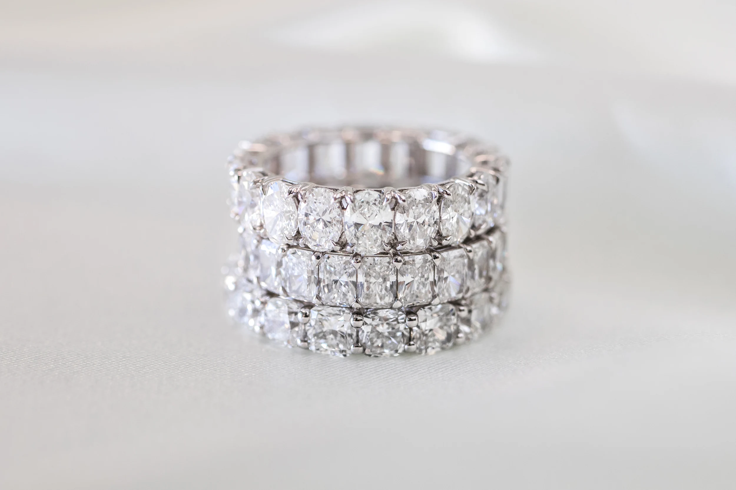 Diamonds set in Oval French U Eternity Band (Profile View)