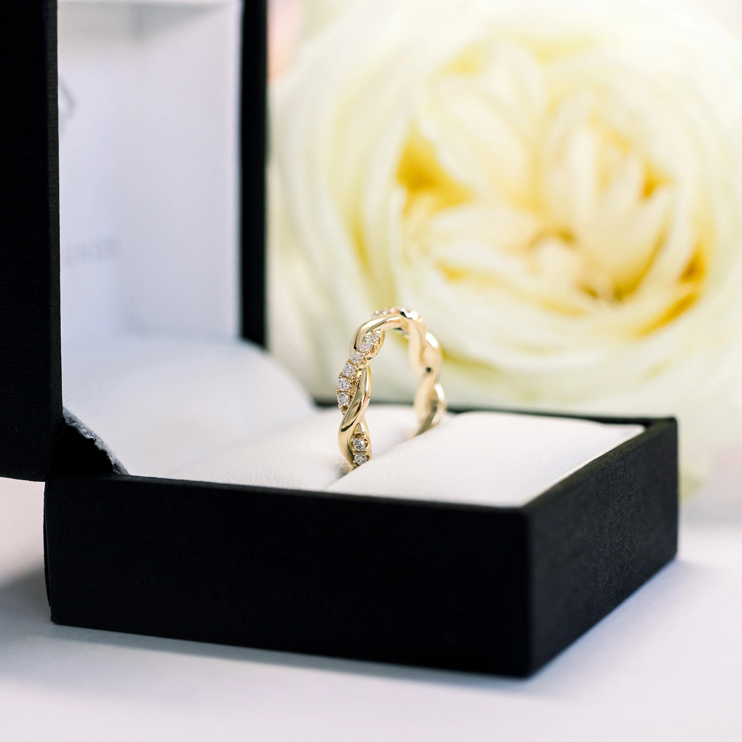 18k Yellow Gold Infinity Twisting Light Eternity Band featuring 0.45 ct Round Brilliant Diamonds (Side View)