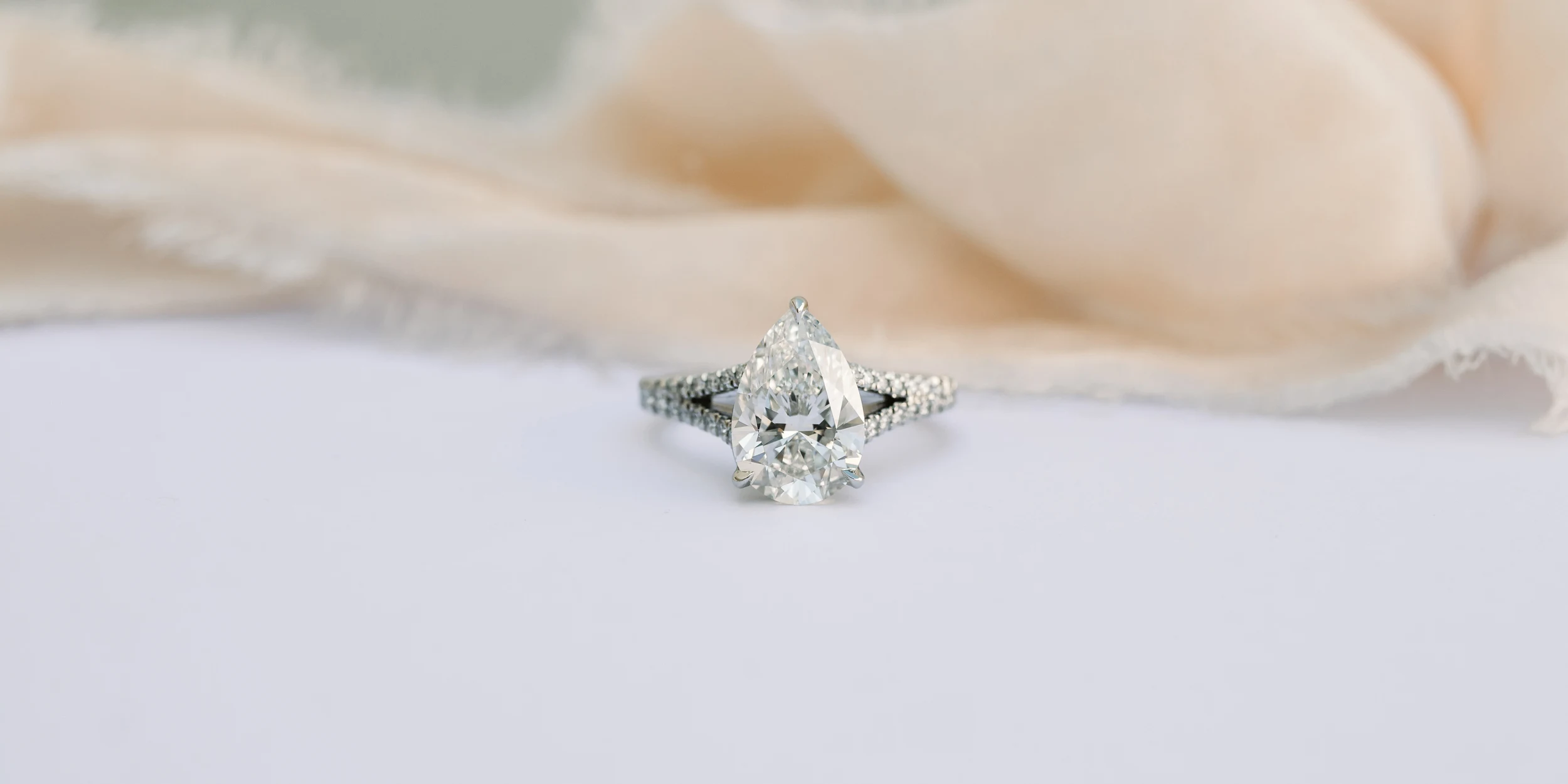 p-Diamonds set in Trellis Split Shank Diamond Engagement Ring