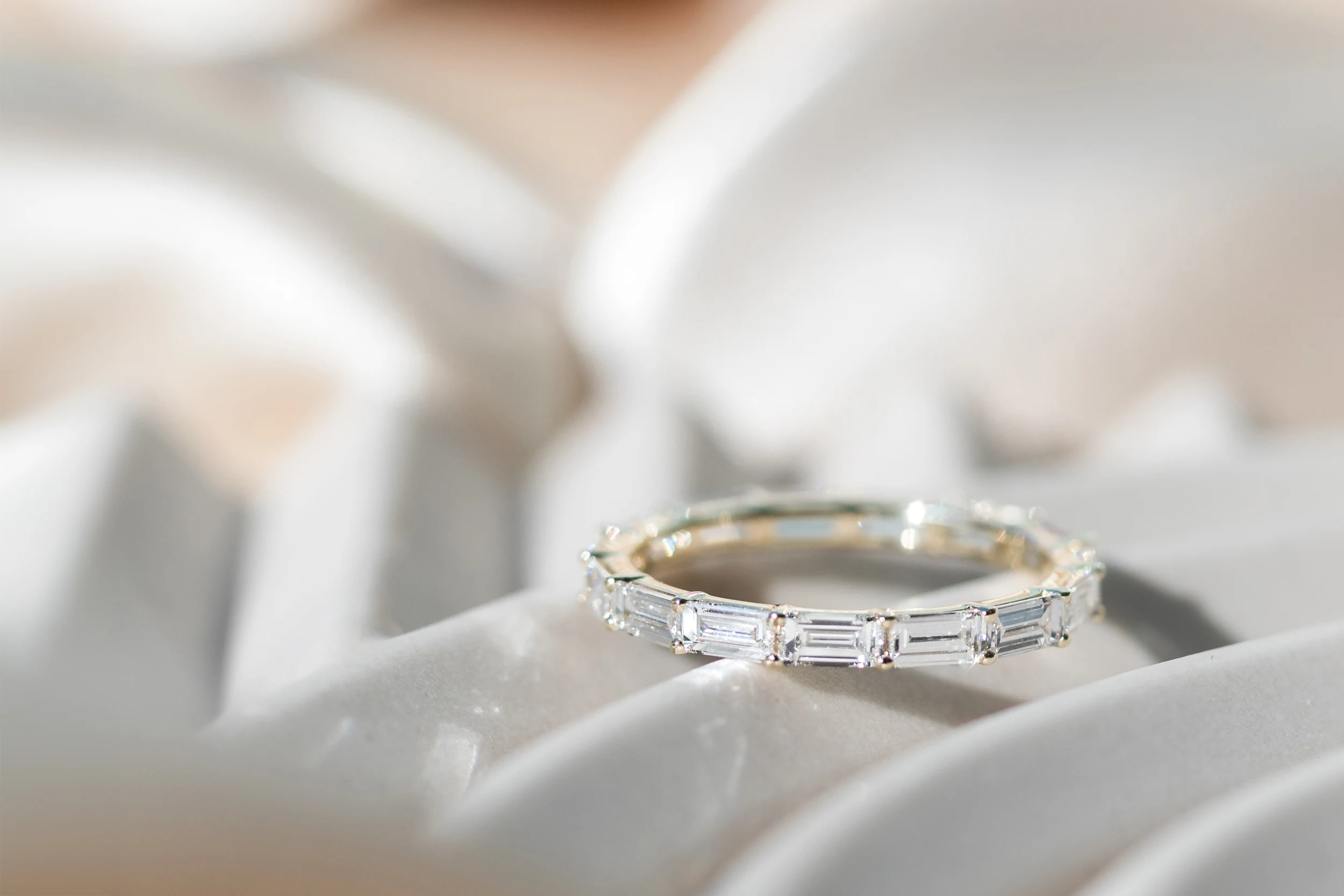 Diamonds set in Baguette East-West Eternity Band (Profile View)
