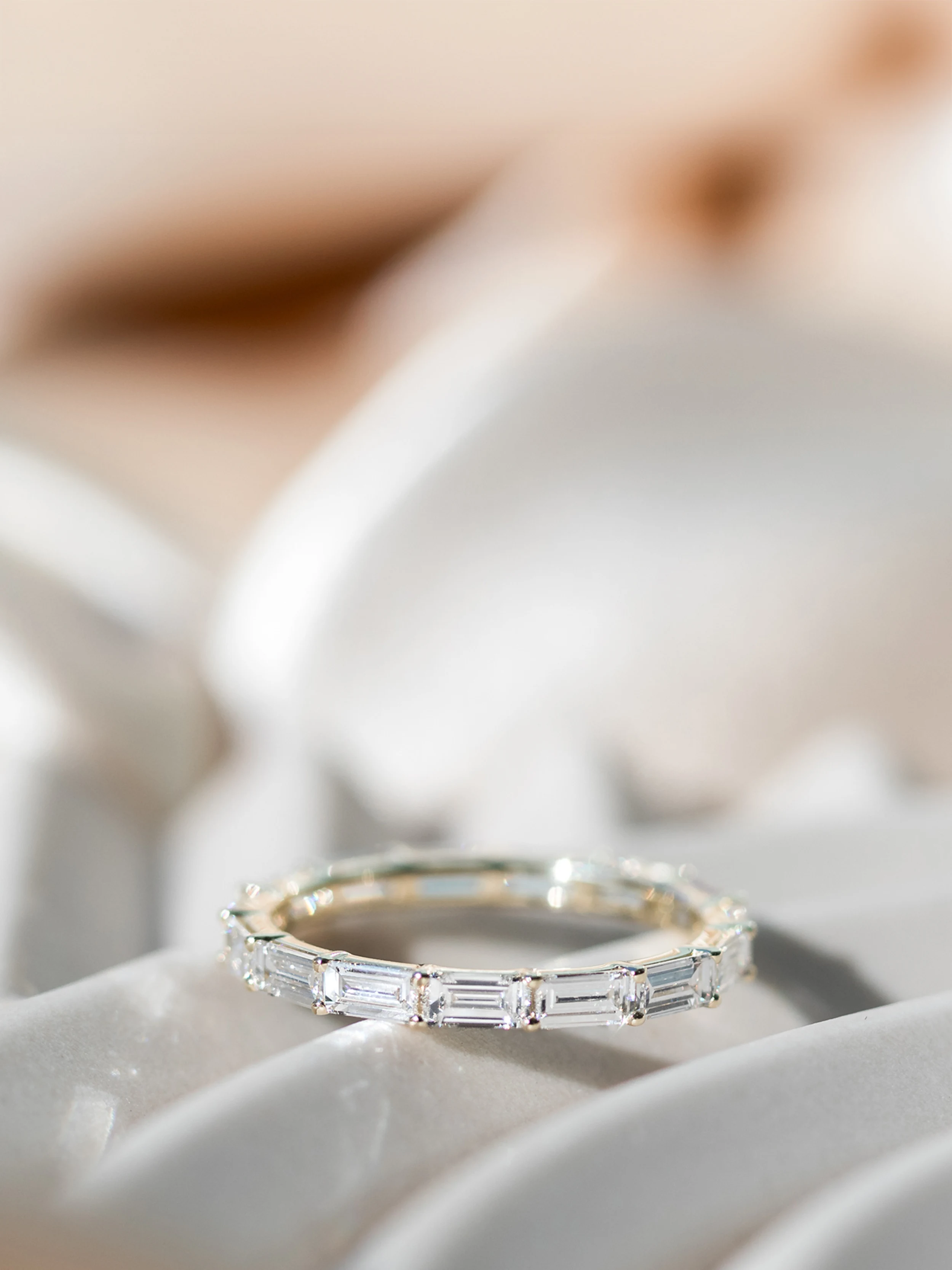 Baguette East-West Eternity Band featuring Diamonds (Profile View)