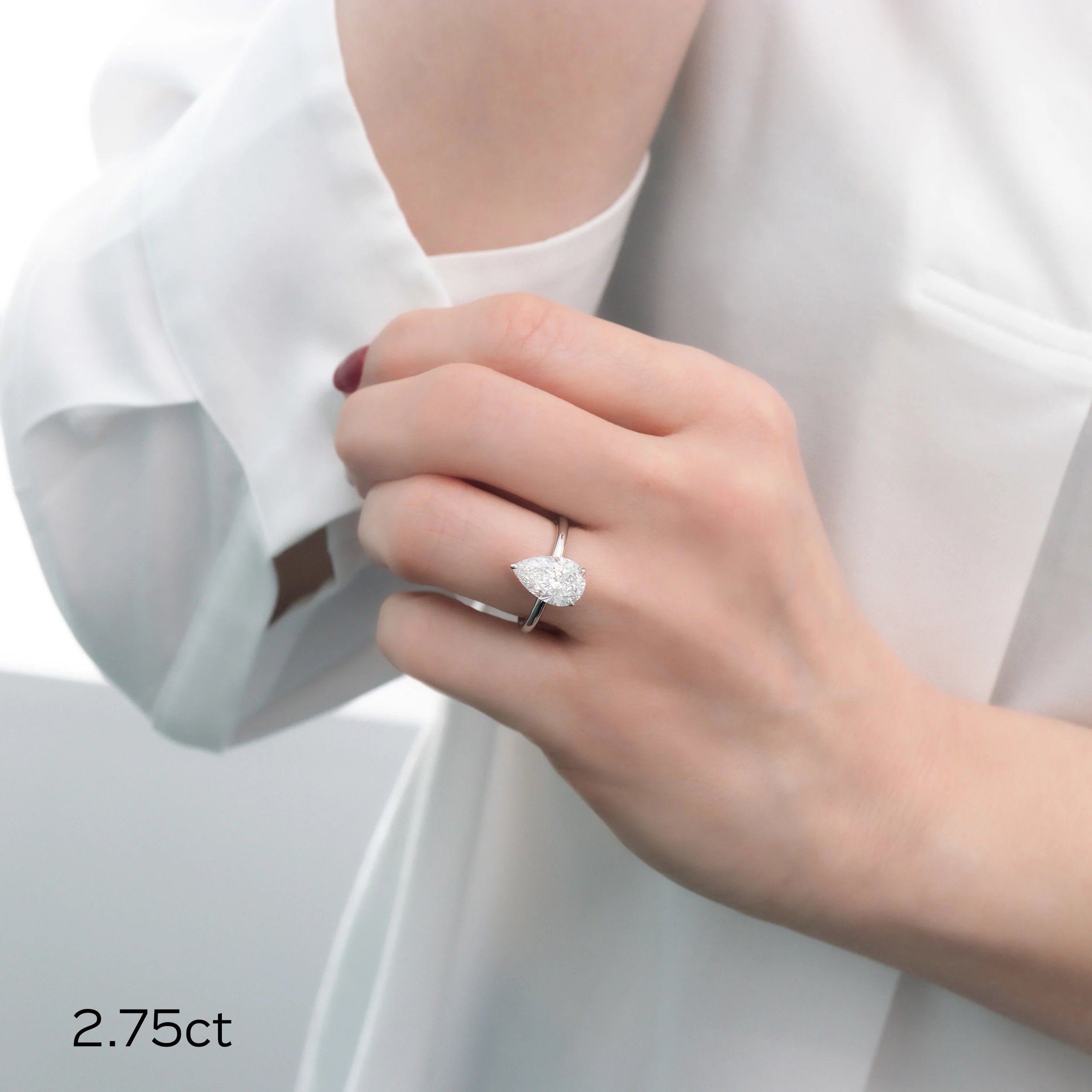 Exceptional Quality 2.5 ctw Lab Diamonds set in Platinum Pear Petite Solitaire Diamond Engagement Ring (Main View)