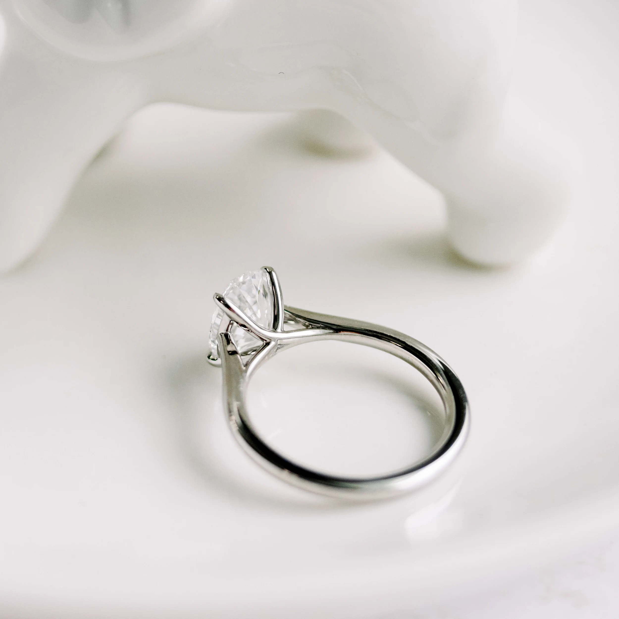 Exceptional Quality 1.75 Carat Lab Diamonds Oval Trellis Solitaire Diamond Engagement Ring in Platinum (Profile View)