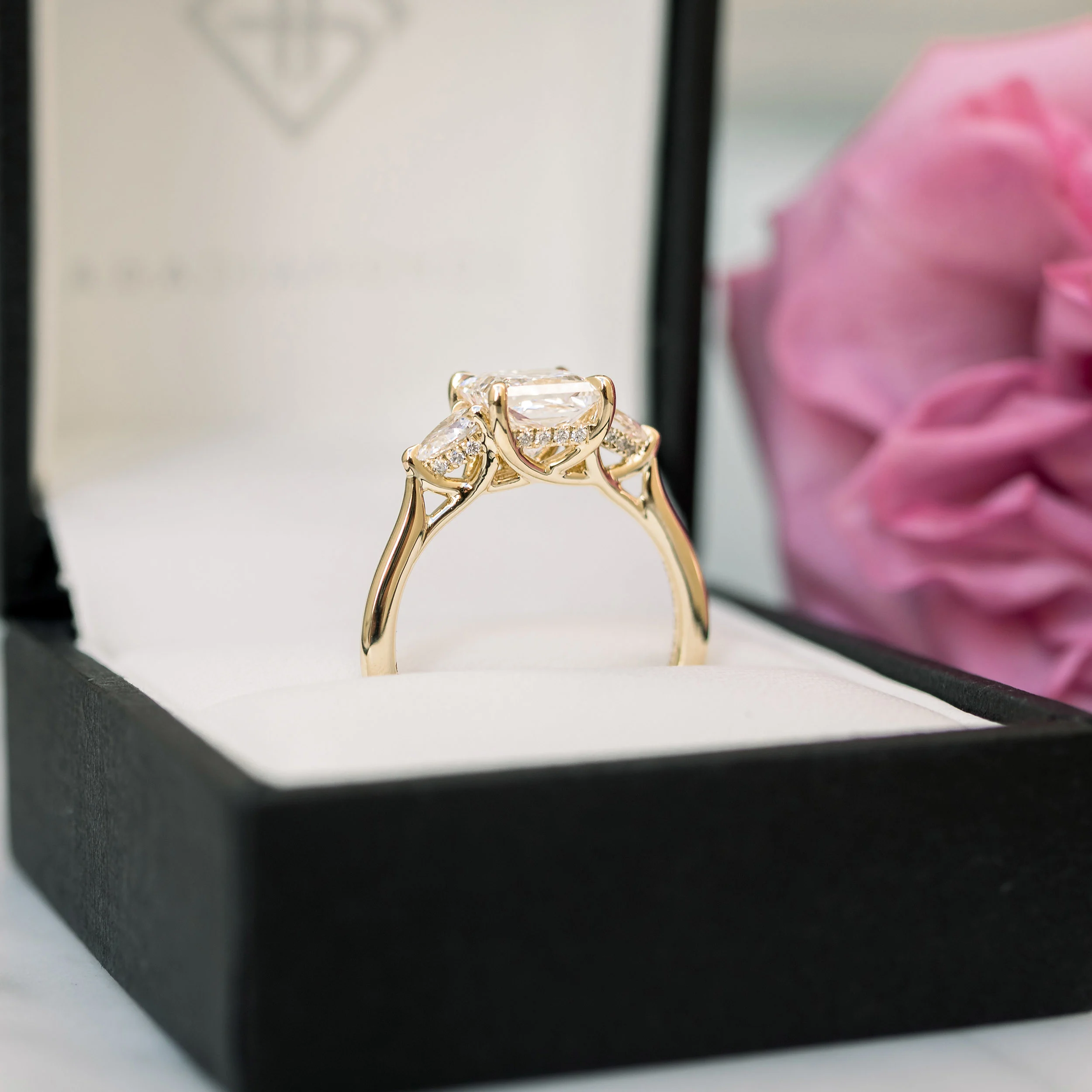 Yellow Gold Princess and Pear Setting featuring 1.75 Carat Lab Diamonds (Profile View)