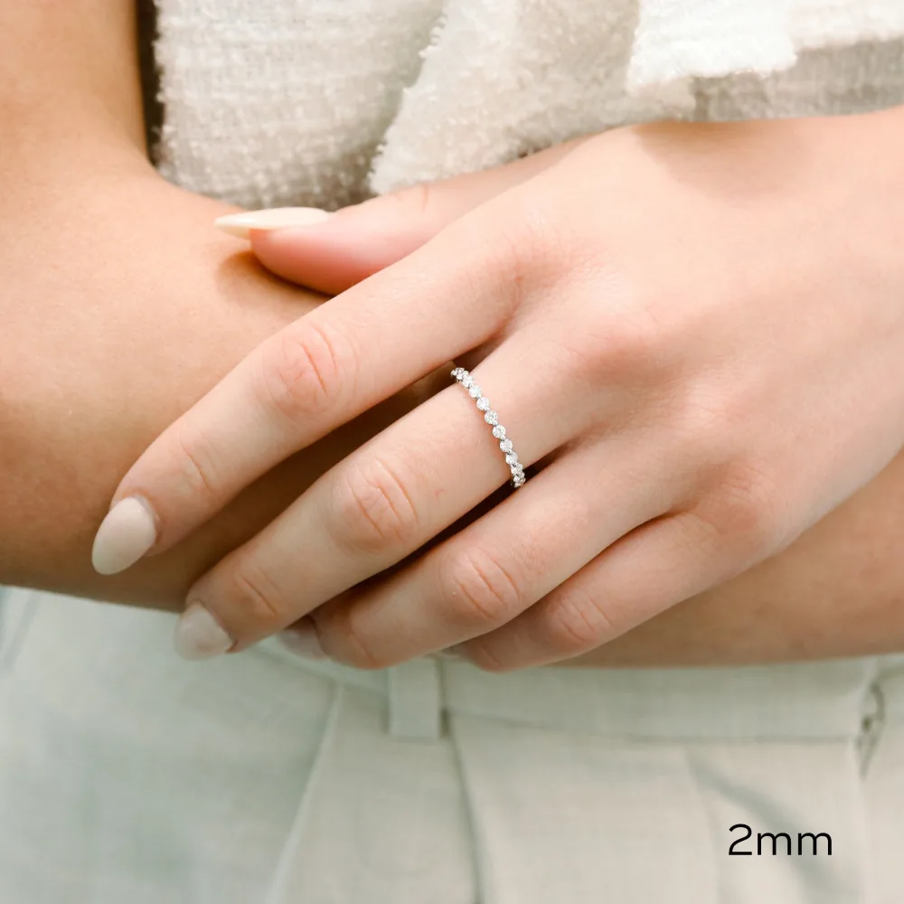 white gold 2mm round lab diamond shared prong eternity band ada diamonds design ad 261 on model