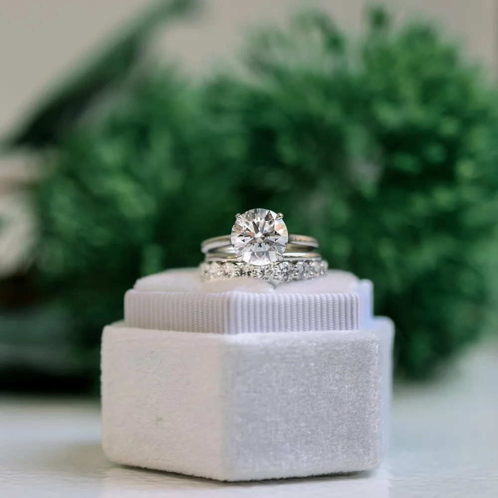 round-man-made-diamond-wedding-set-with-trellis-solitaire-engagement-ring-with-prong-set-three-quarter-band-platinum-ada-diamonds-design-ad-069-ad-081-macro_1683069373187-RK41QH8R69F3VG3BGAY5