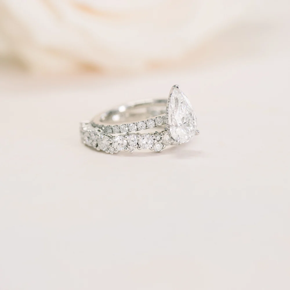 platinum multishape lab diamond cluster wedding band with pear three prong pavé lab diamond engagement ring ada diamonds design ad 211 and ad 272