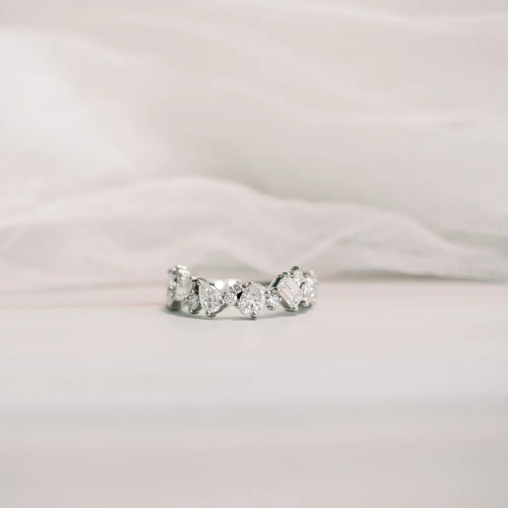 platinum multi shape wedding band with oval, pear, princess, round, emerald cut lab diamonds ada diamonds design ad 272 macro