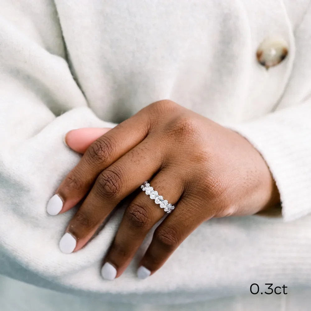 5-carat-french-u-oval-lab-grown-diamond-wedding-band-0-3-each-platinum-ada-diamonds-design-ad-193-on-model_1683142994223-EUO0KHC3ZBEE5YMXZ0EK