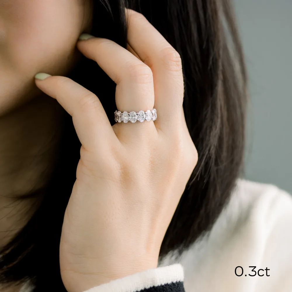 5 carat oval cut man made diamond eternity band platinum ada diamonds design ad193 on model