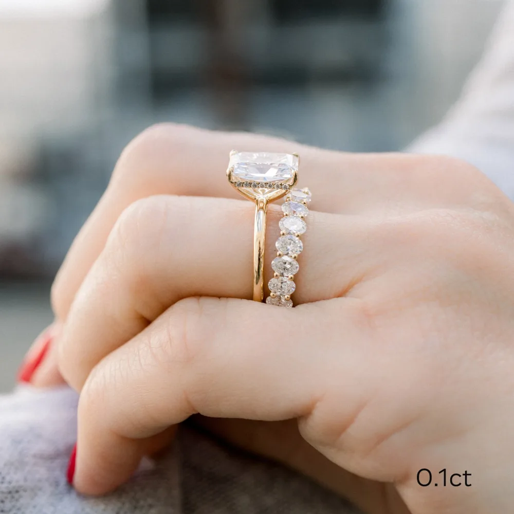 yellow gold radiant cut lab diamond solitaire and oval eternity band ada diamonds design ad 193 and ad250 on model