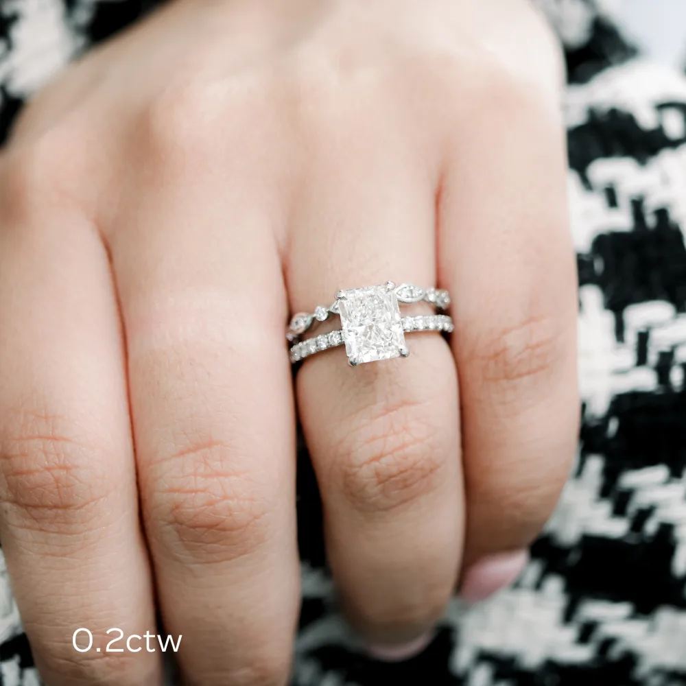 platinum 2.5ct radiant cut lab diamond pavé engagement ring with leaf wedding band in platinum ada diamonds design ad 229 and ad 216 on model