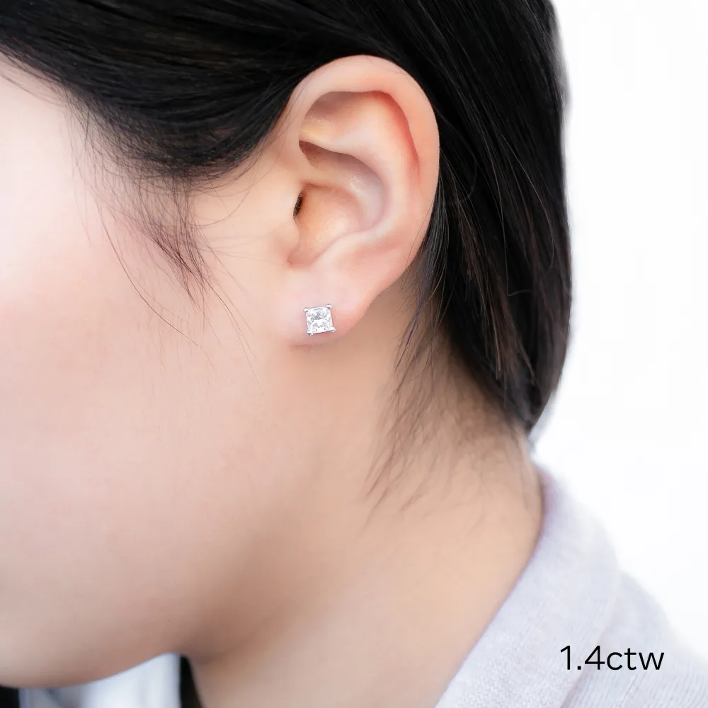 1.4 ctw 0.7ct each Princess Stud Earrings in white gold made with laboratory grown diamonds ADA Diamonds ad design number 002 on model