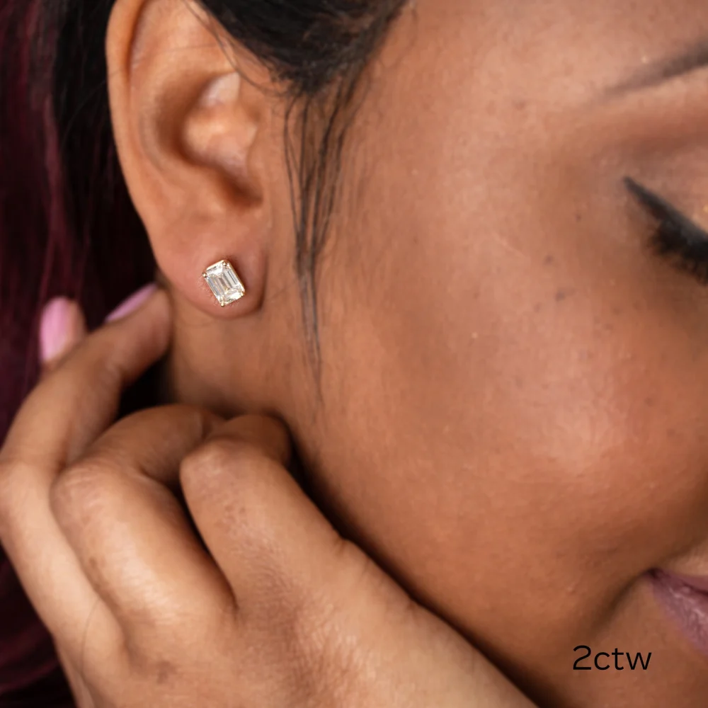2ctw emerald cut stud earrings in yellow gold made with laboratory made diamonds ADA Diamonds ad 003 on model