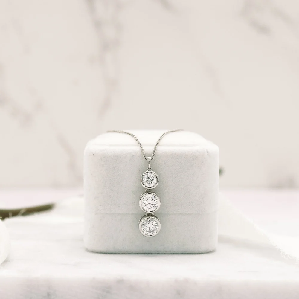 platinum 2 ct round three stone lab diamond bezel set drop necklace ada diamonds design ad 037