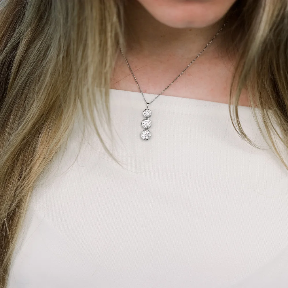 platinum round lab diamond triple bezel cosmopolitan necklace ada diamonds design ad 037 on model