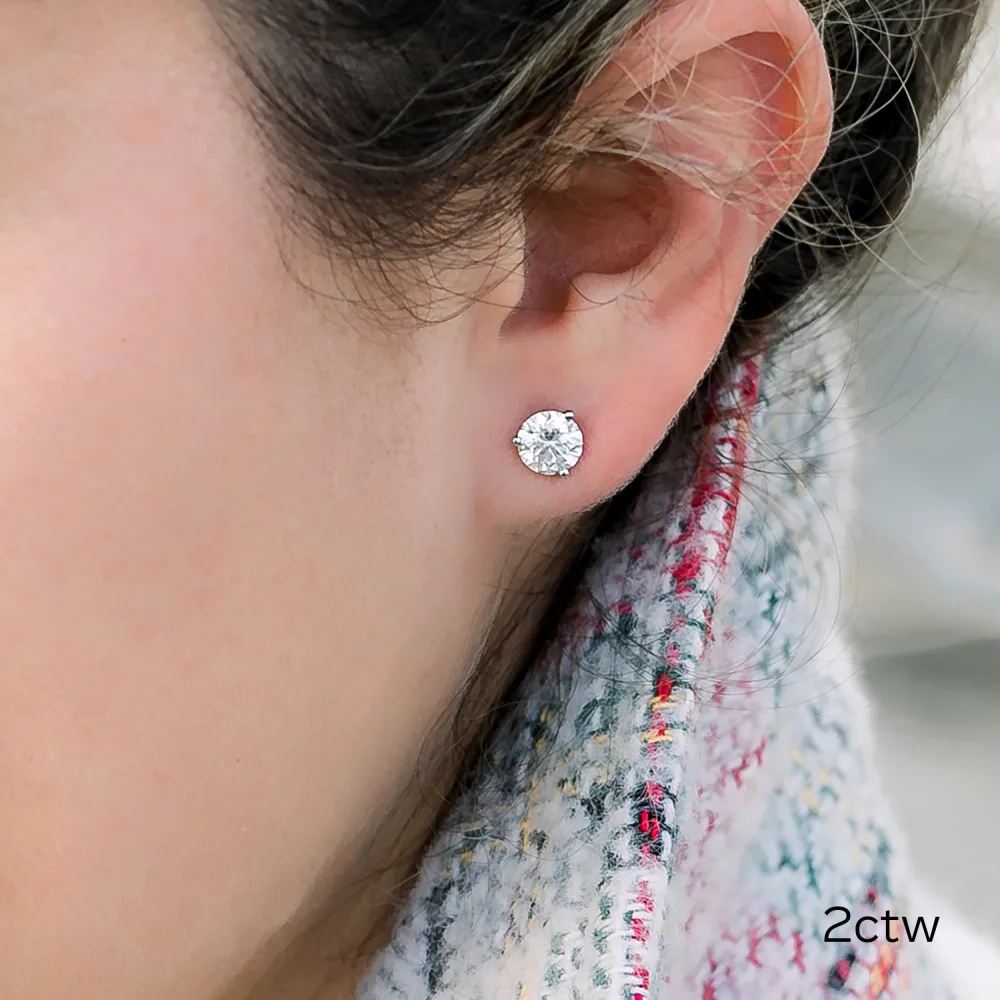 white gold 2 carat round lab diamond stud earrings on model