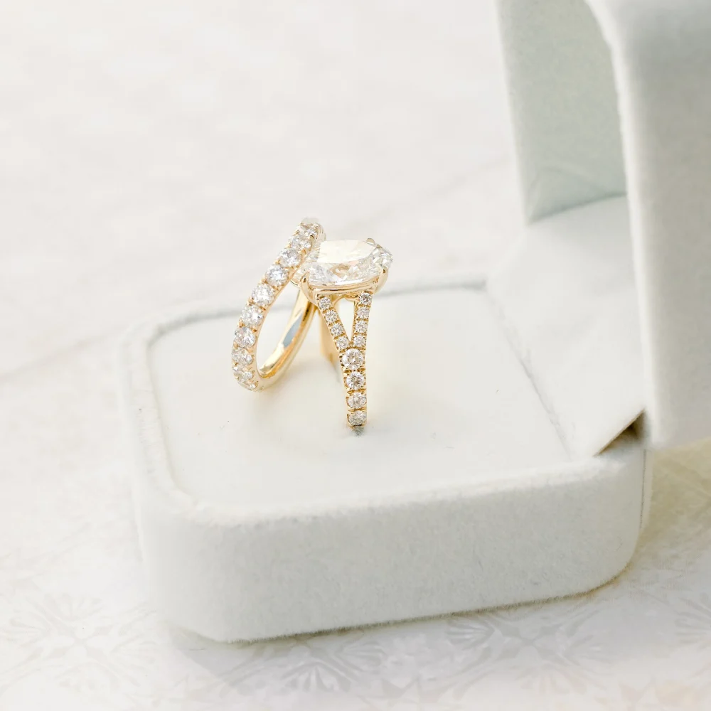 custom 14k yellow gold 3/4 nesting wedding band with oval lab diamond engagement ring ada diamonds design ad262 and ad153
