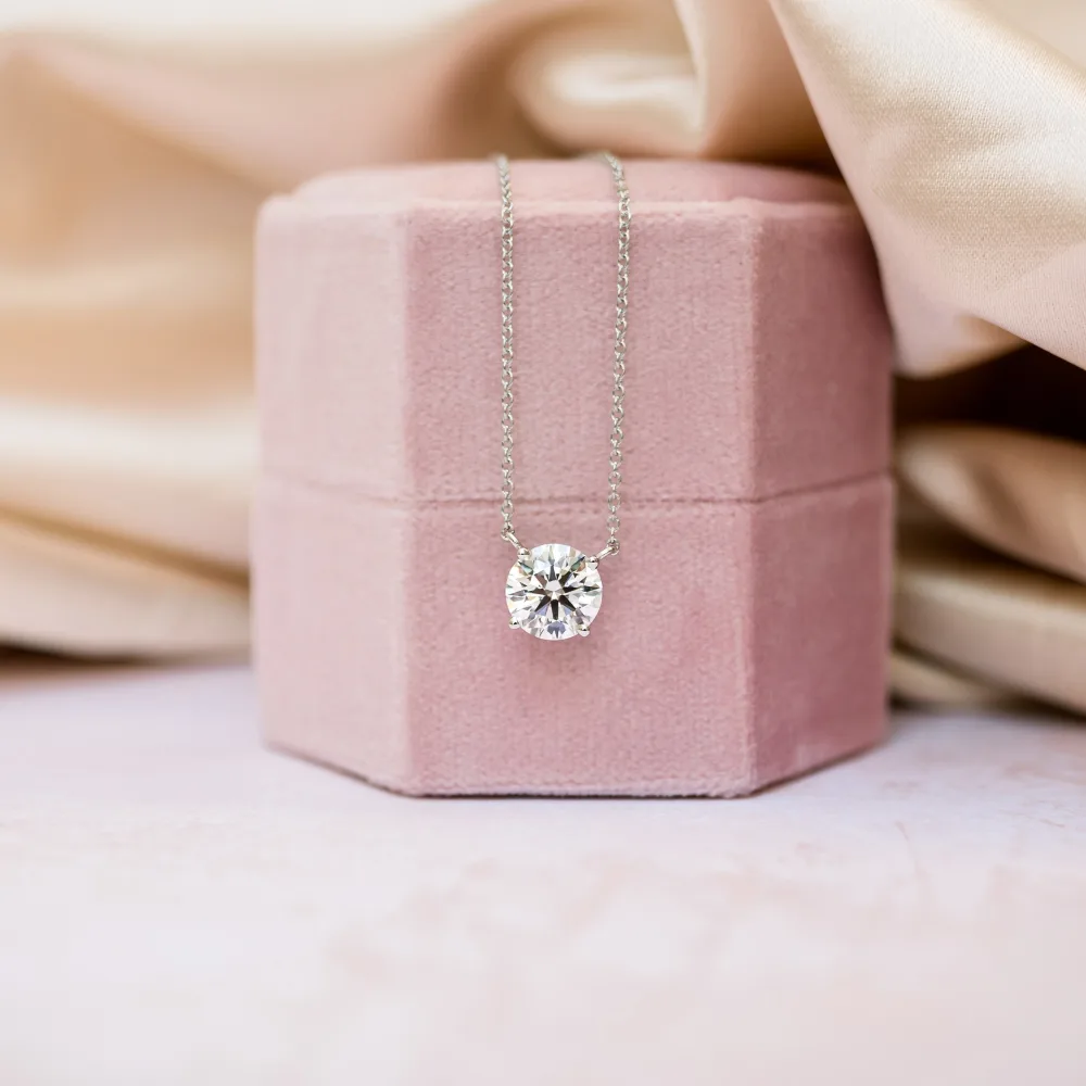 white gold 1.5 ct round lab diamond floating pendant on model ada diamonds design ad 384