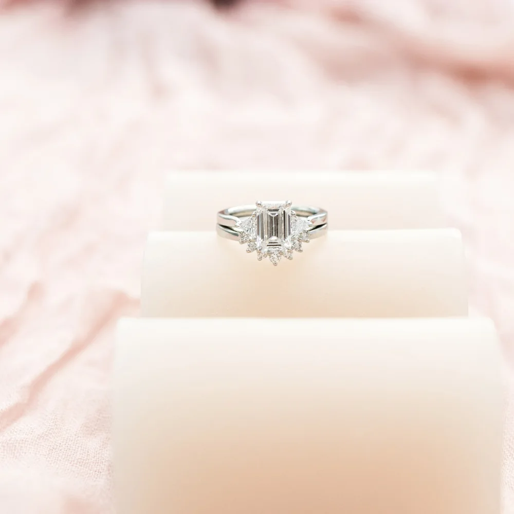 platinum emerald cut and trillion three stone engagement ring with nesting band ada diamonds design ad 258 and ad 466