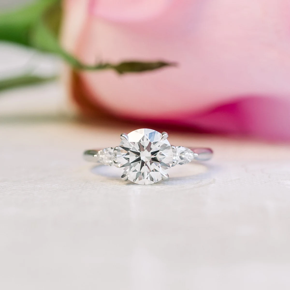 Round and Pear Diamond Engagement Ring