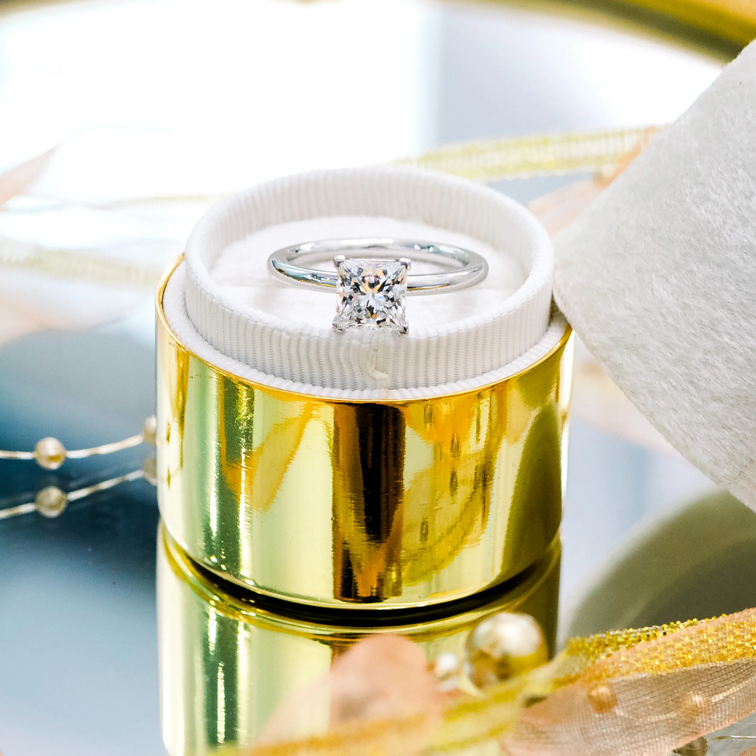 White Gold Princess Petite Four Prong Solitaire Diamond Engagement Ring featuring 1.5 Carat Lab Diamonds (Profile View)