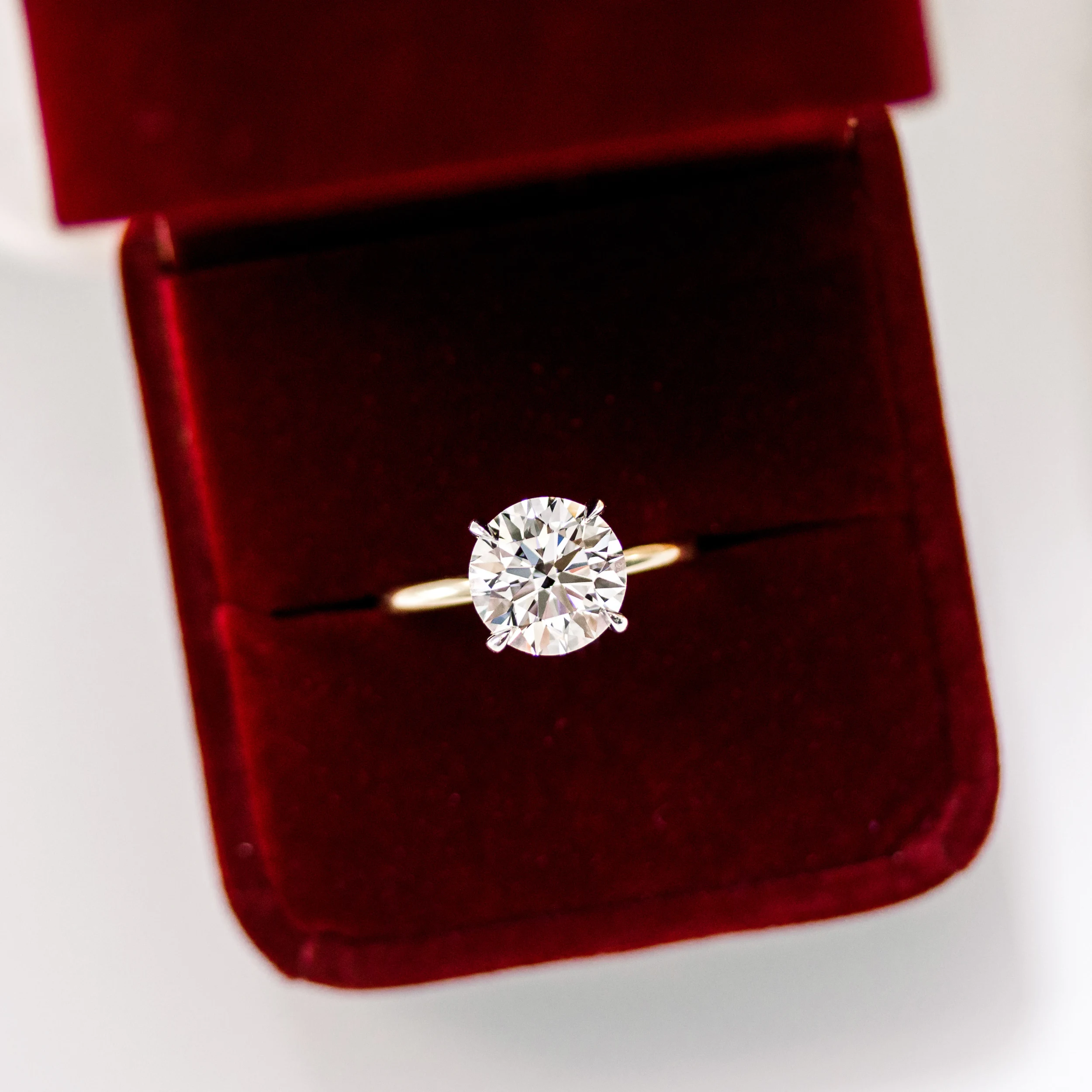 Yellow Gold Round Petite Four Prong Solitaire featuring 3.0 ctw Created Diamonds (Profile View)