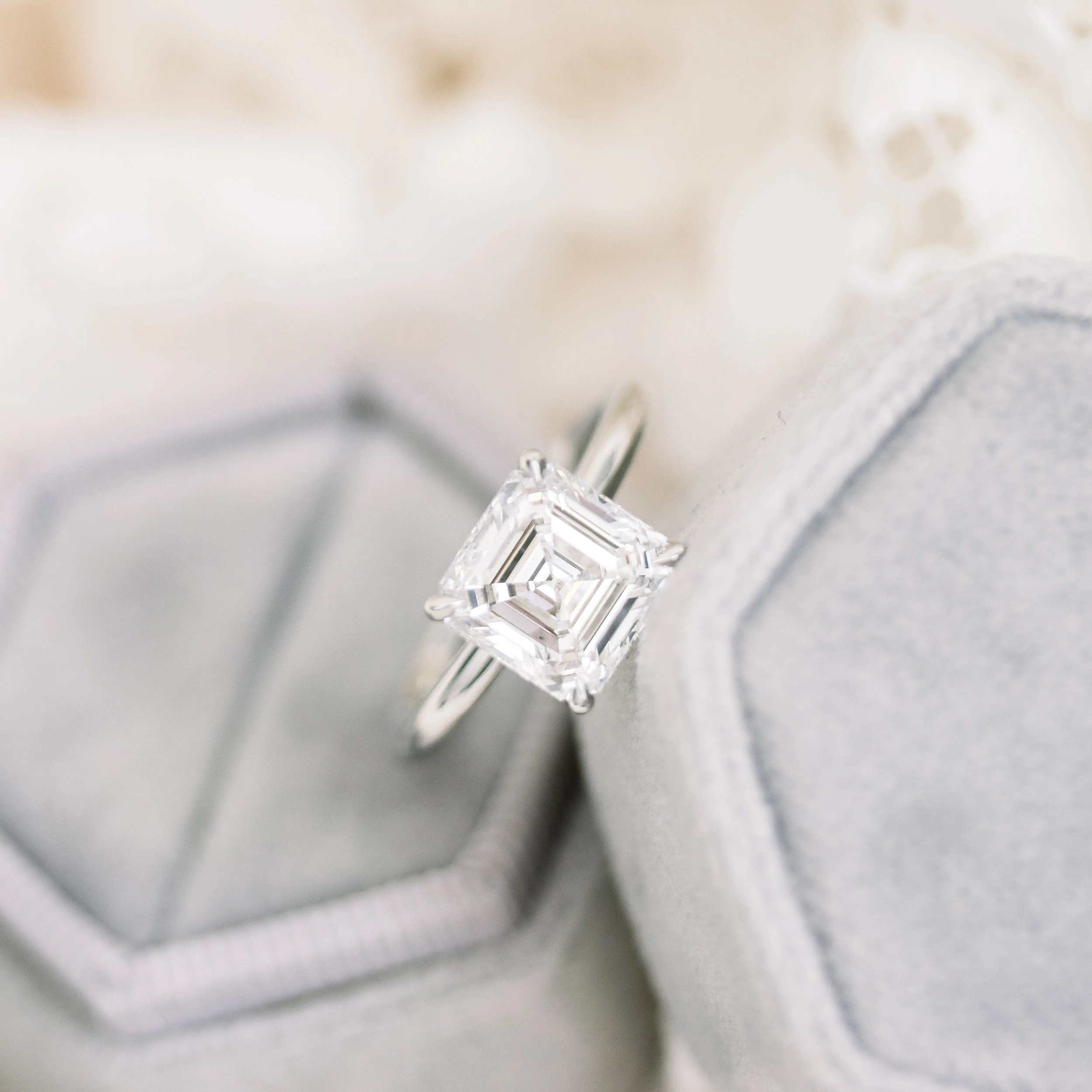 Platinum Asscher Petite Four Prong Solitaire featuring Hand Selected 3.0 ct Lab Grown Diamonds (Profile View)